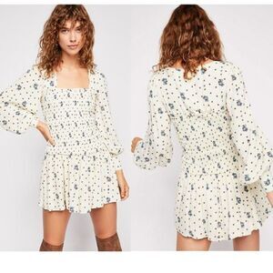 Free People Two Faces ruched waist mini dress. Size Medium .Very Good Condition!